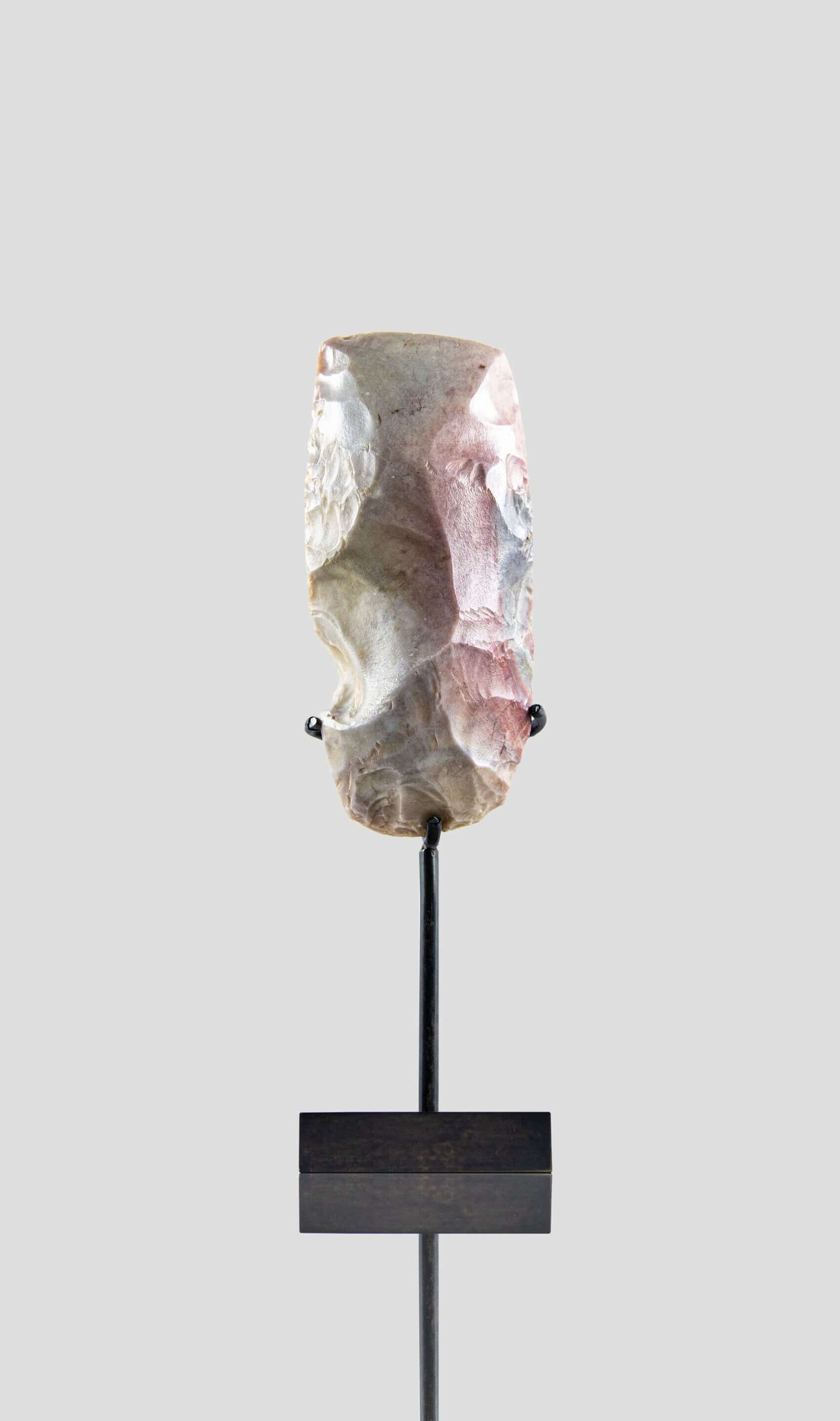 artefact hand axe for sale on bronze stand 3