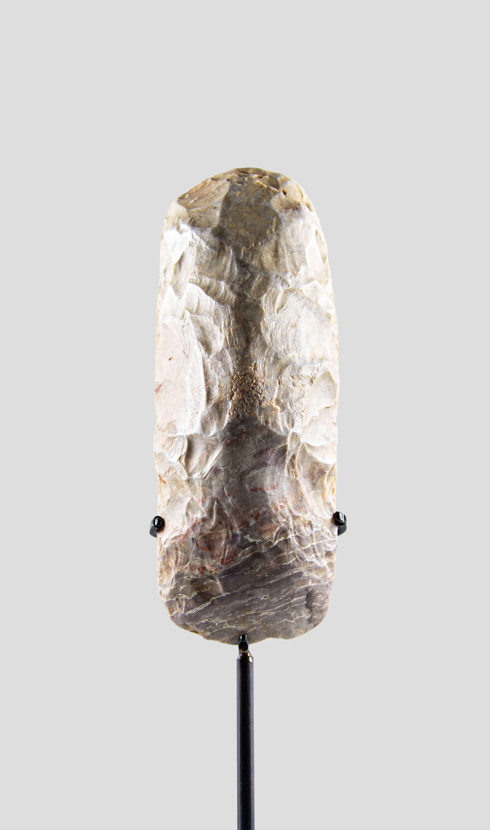 artefact hand axe for sale on bronze stand 2