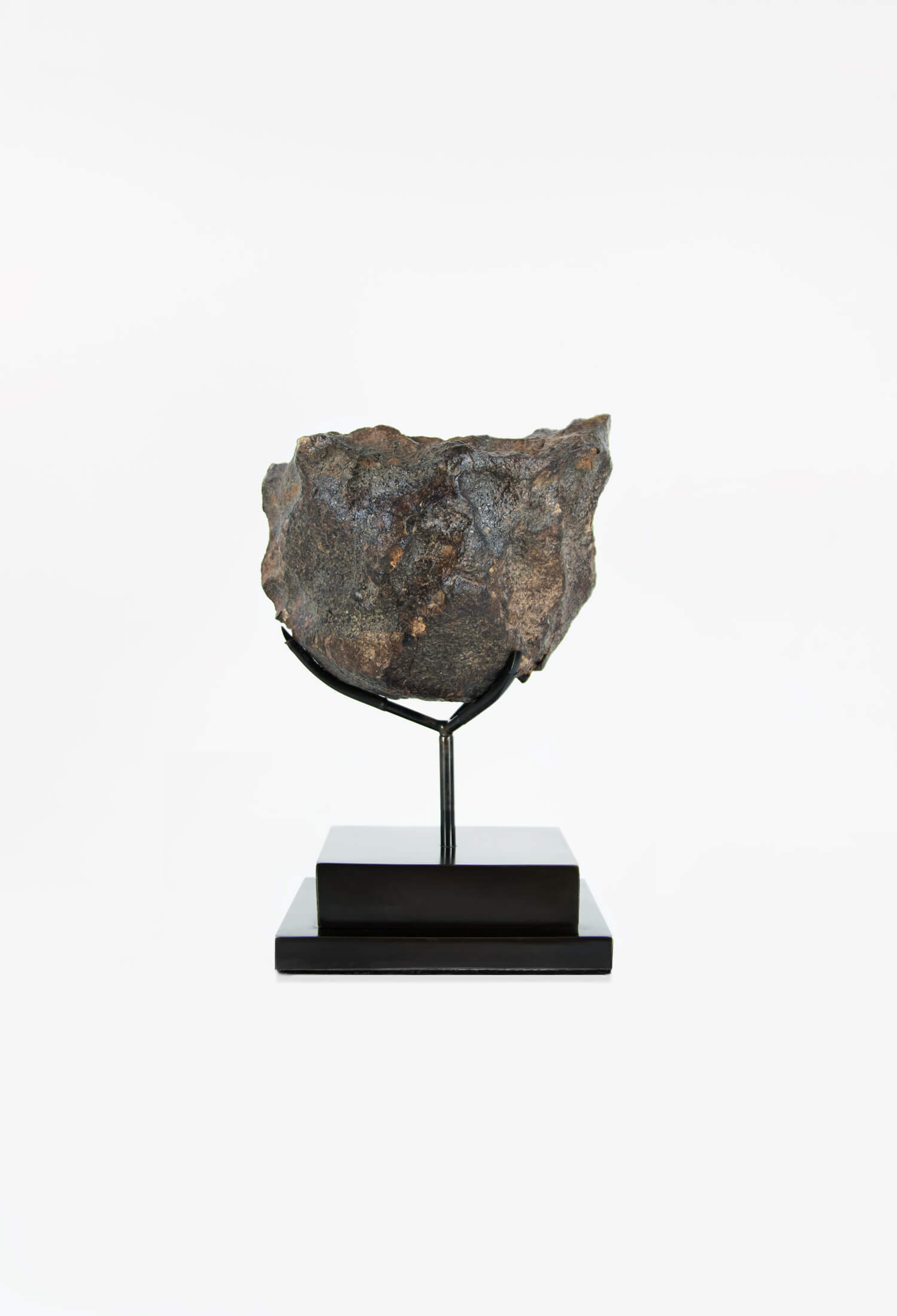 Our fallen star series NWA H5 Iron Meteorite for sale presented on a custom-designed bronze stand weighing 3055 grams