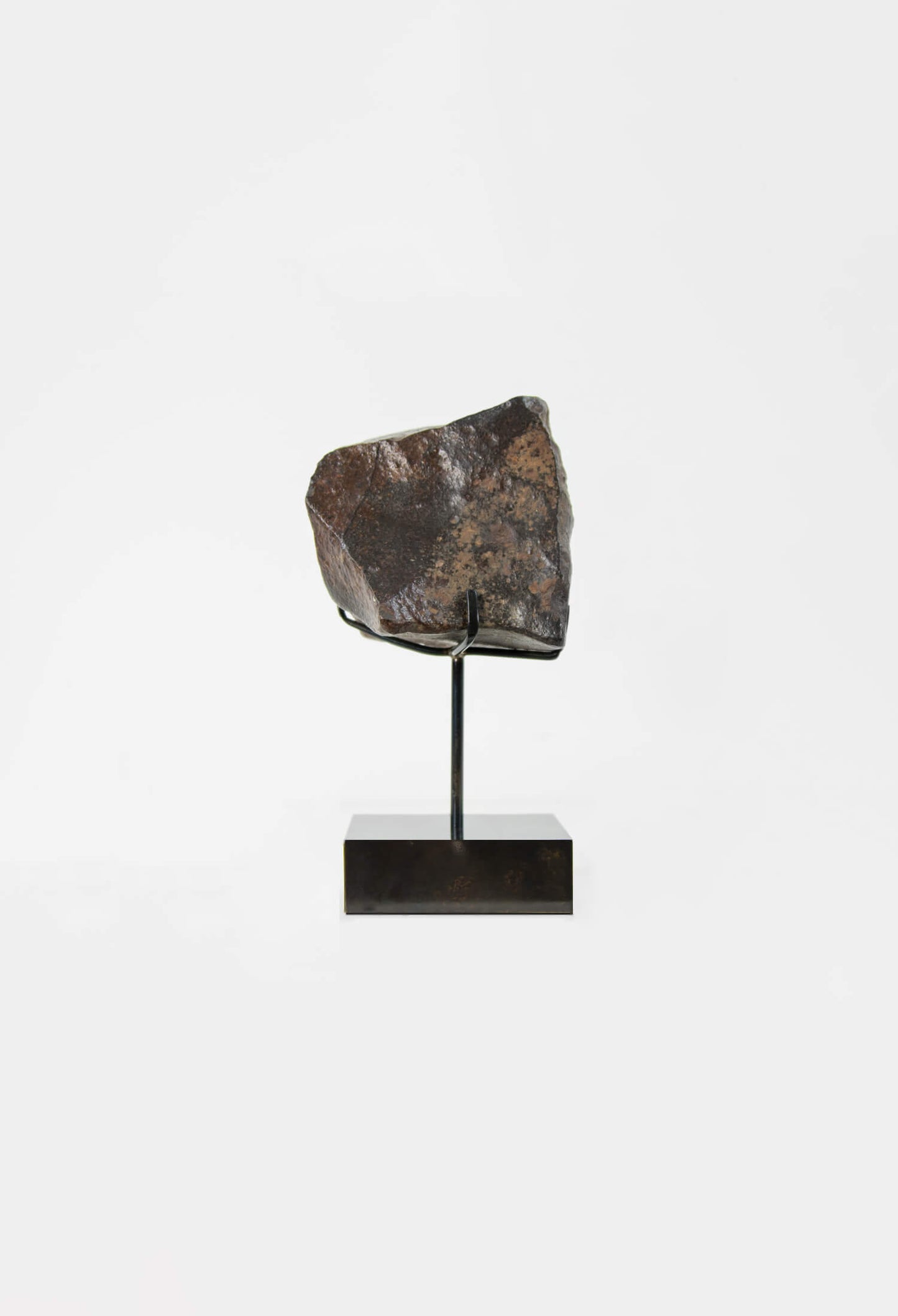 Our fallen star series NWA H5 Iron Meteorite presented on a luxury custom-designed bronze stand weighing 1141 grams