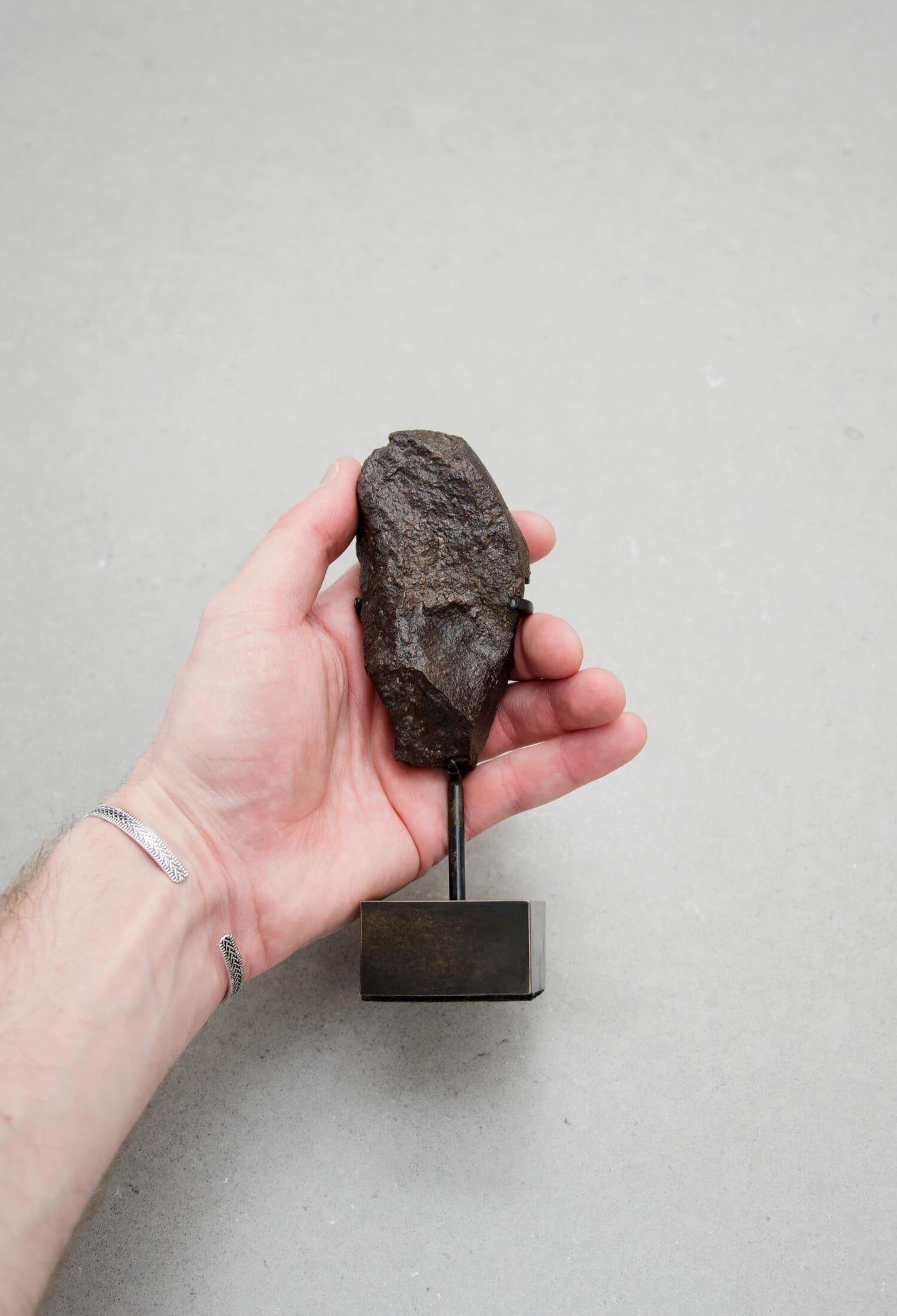 Our fallen star series NWA H5 Iron Meteorite presented on a luxury custom-designed bronze stand weighing 306 grams