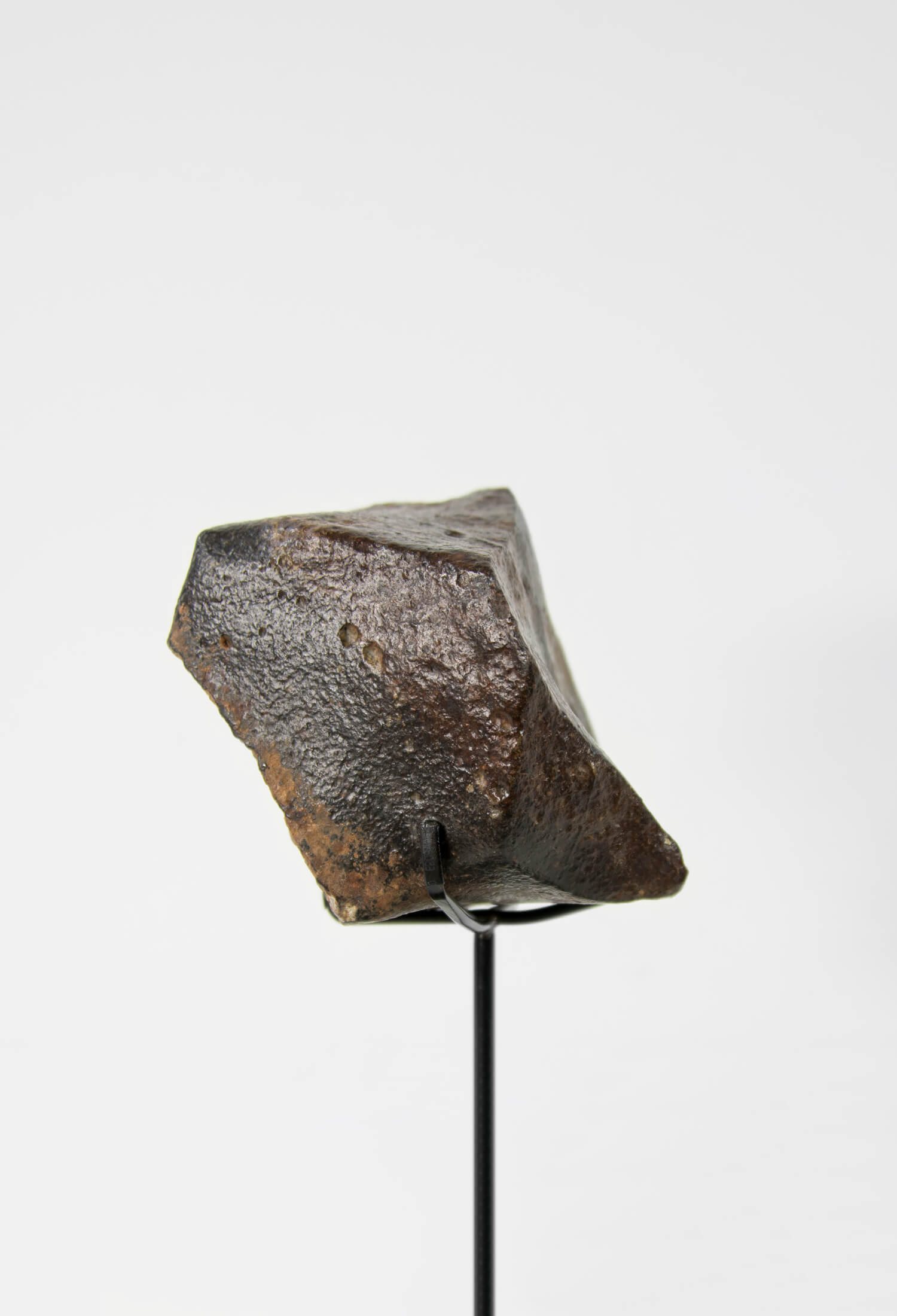 Our fallen star series NWA H5 Iron Meteorite presented on a luxury custom-designed bronze stand weighing 1141 grams