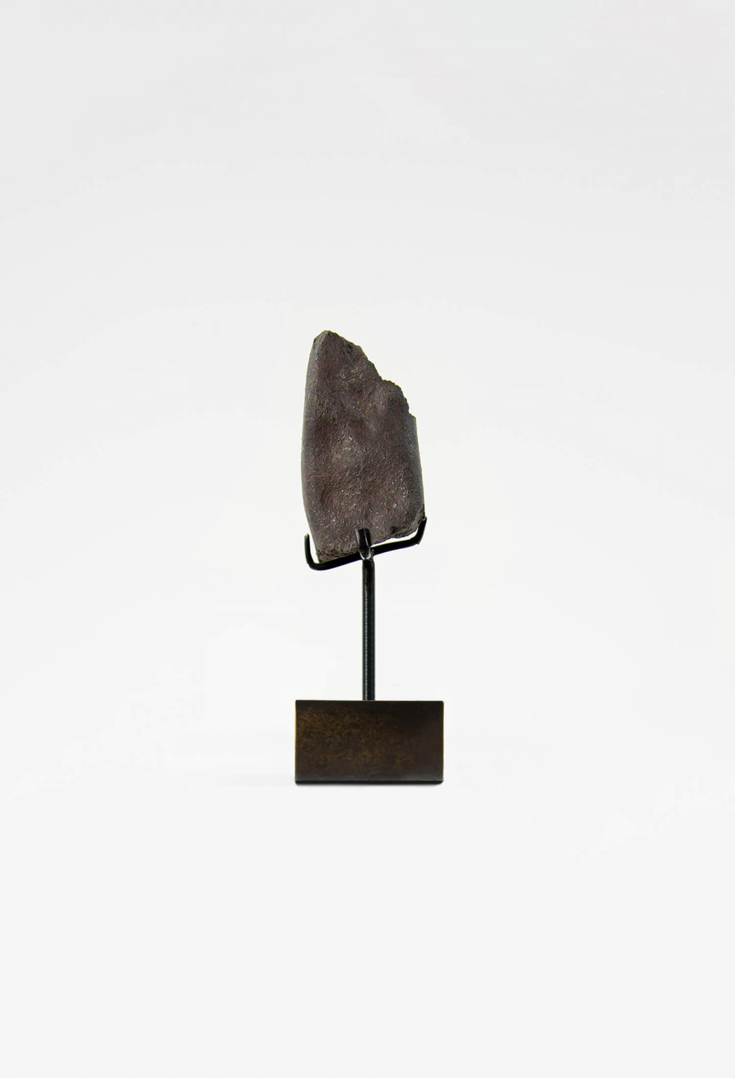 Our fallen star series NWA H5 Iron Meteorite presented on a luxury custom-designed bronze stand weighing 234 grams