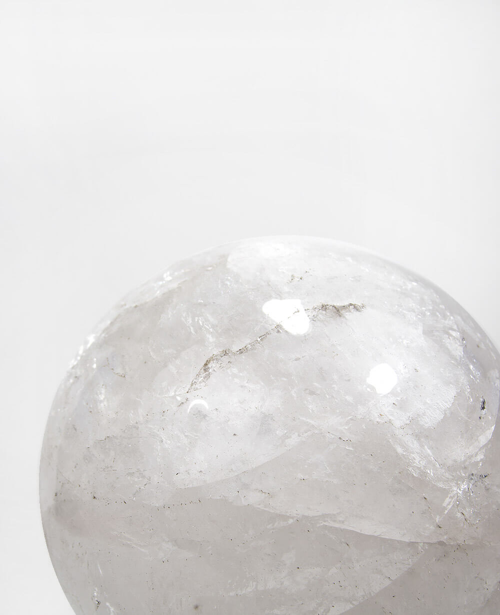 A beautifully hand crafted large Quartz there for center display on our stainless steel ring stand for spaces out there!