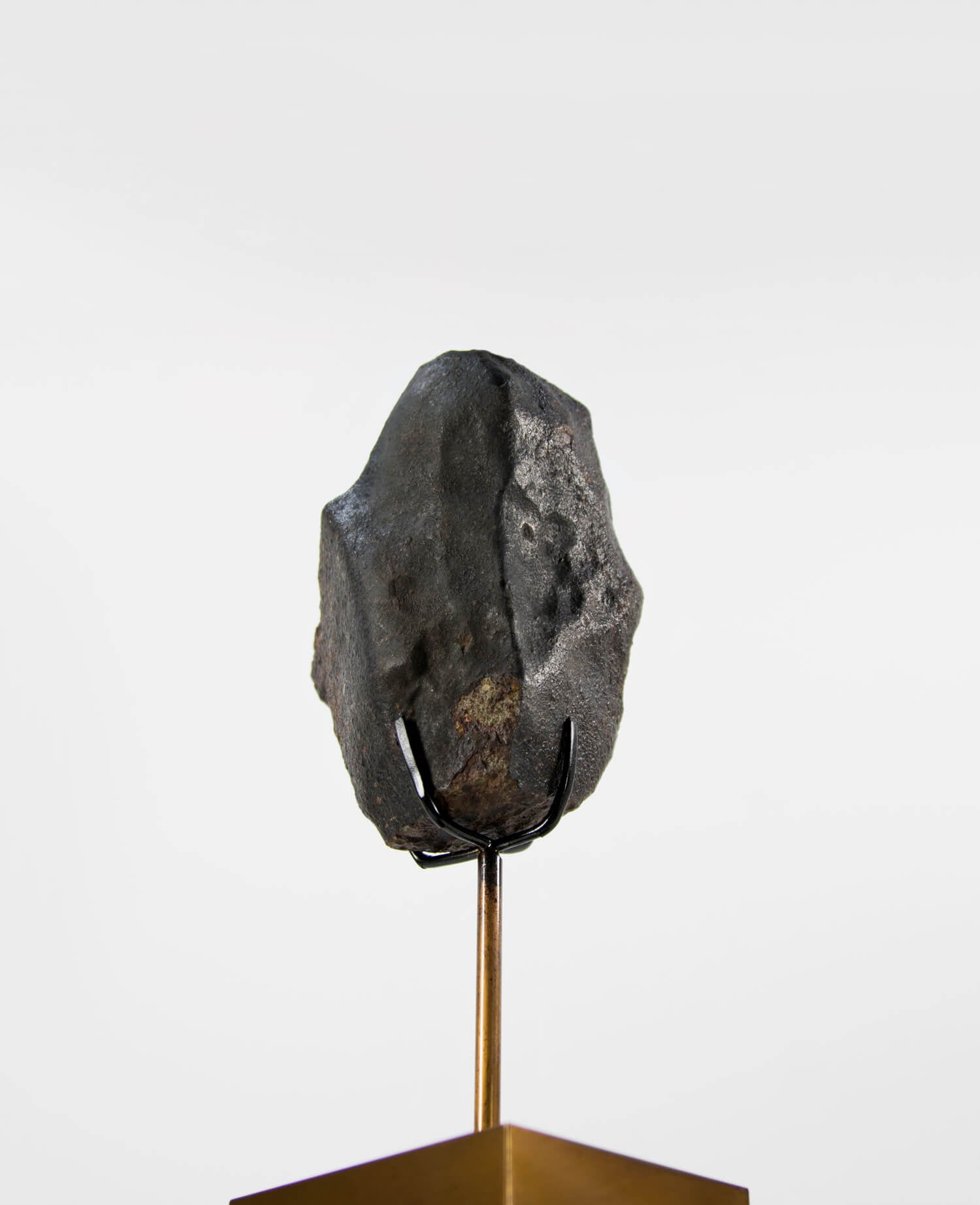 Our fallen star series NWA H5 Iron Meteorite for sale presented on a custom-designed bronze stand weighing 1349 grams