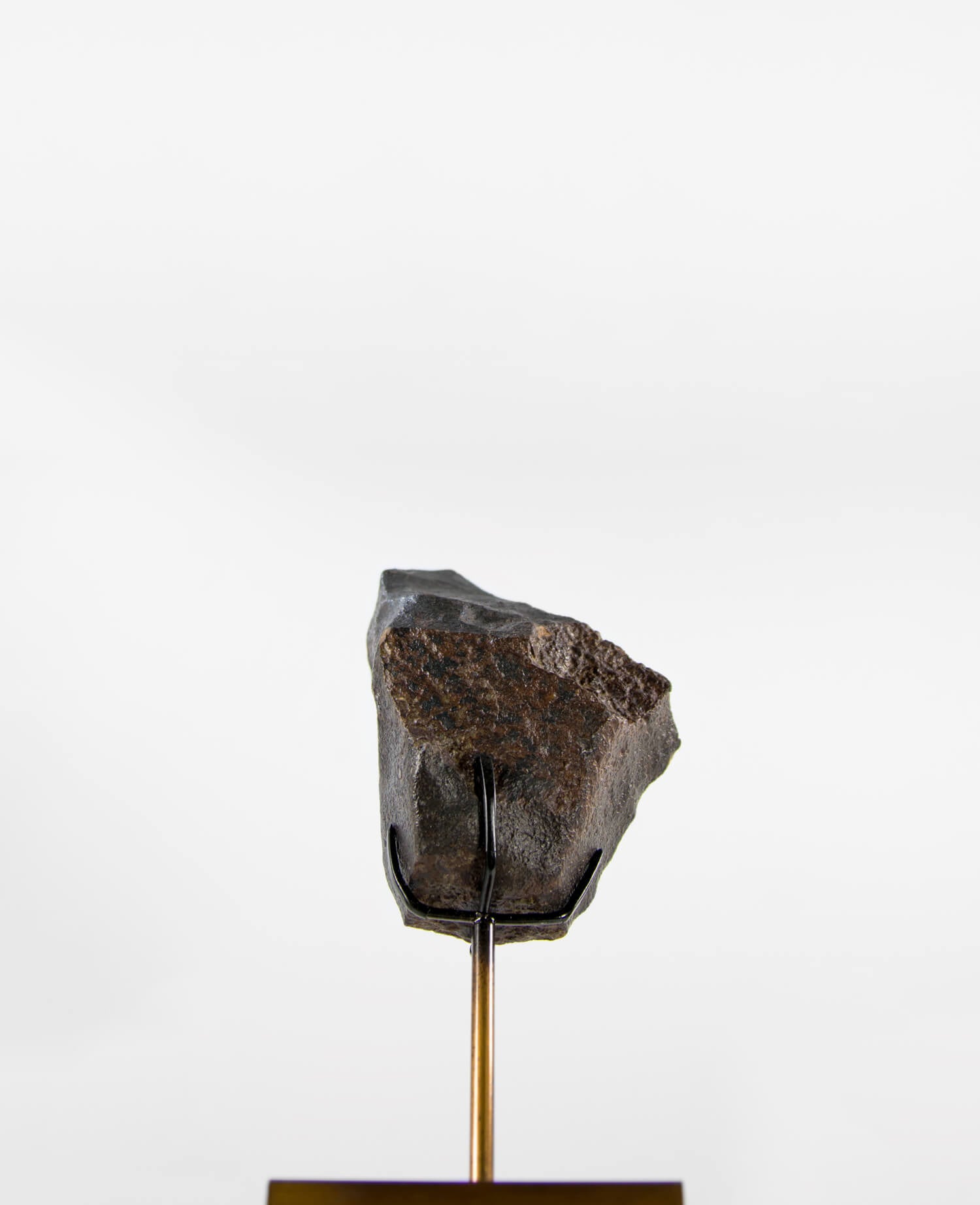 Our fallen star series NWA H5 Iron Meteorite for sale presented on a custom-designed bronze stand weighing 1349 grams