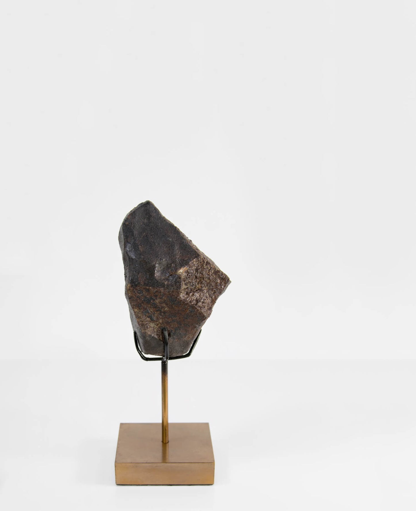 Our fallen star series NWA H5 Iron Meteorite for sale presented on a custom-designed bronze stand weighing 1349 grams