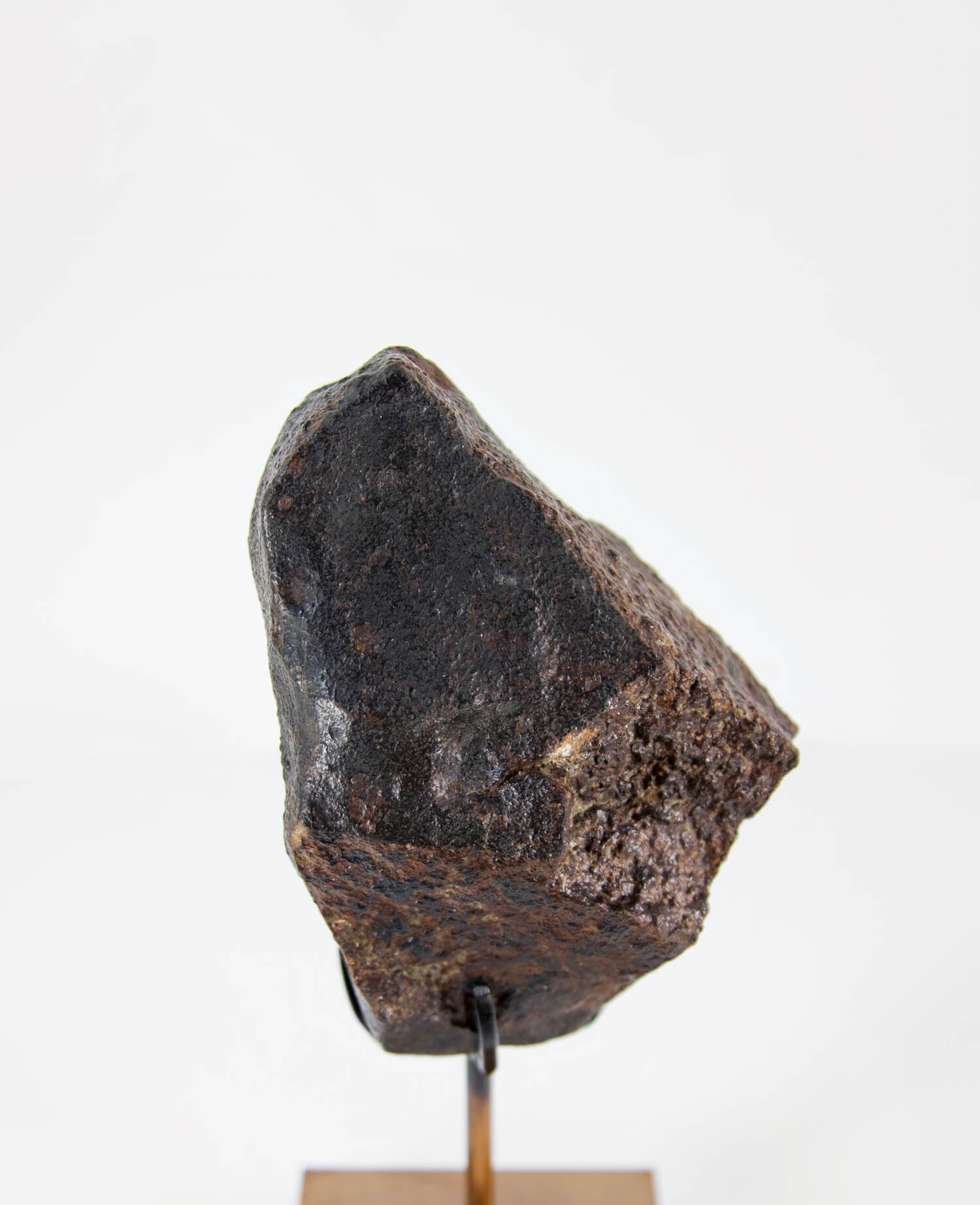 Our fallen star series NWA H5 Iron Meteorite for sale presented on a custom-designed bronze stand weighing 1349 grams