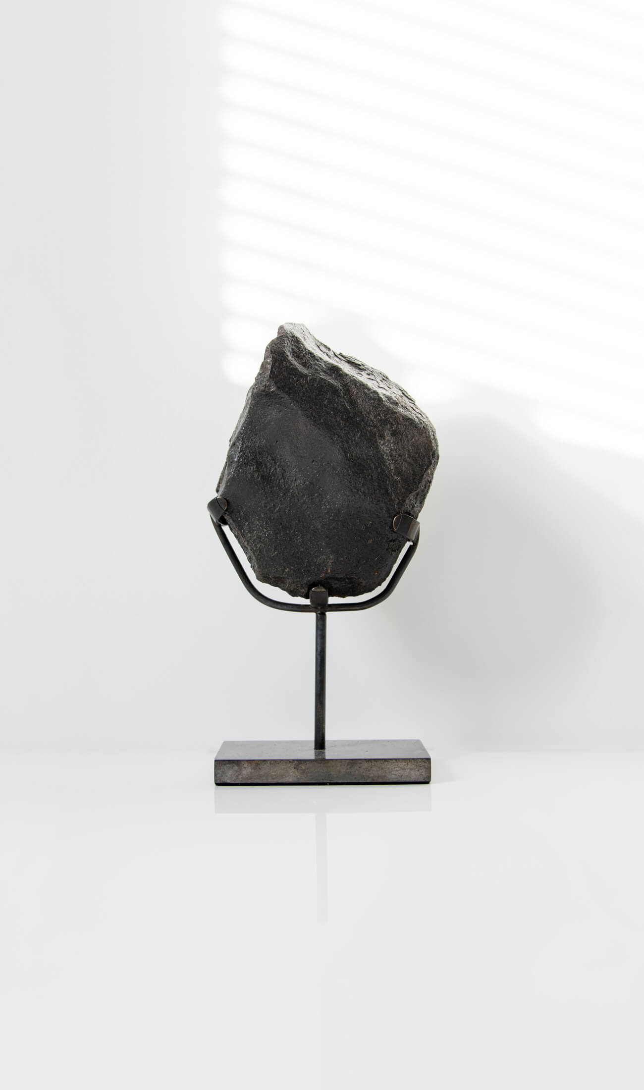 Our fallen star series NWA H5 Iron Meteorite presented on a luxury custom-designed bronze stand weighing 2247 grams