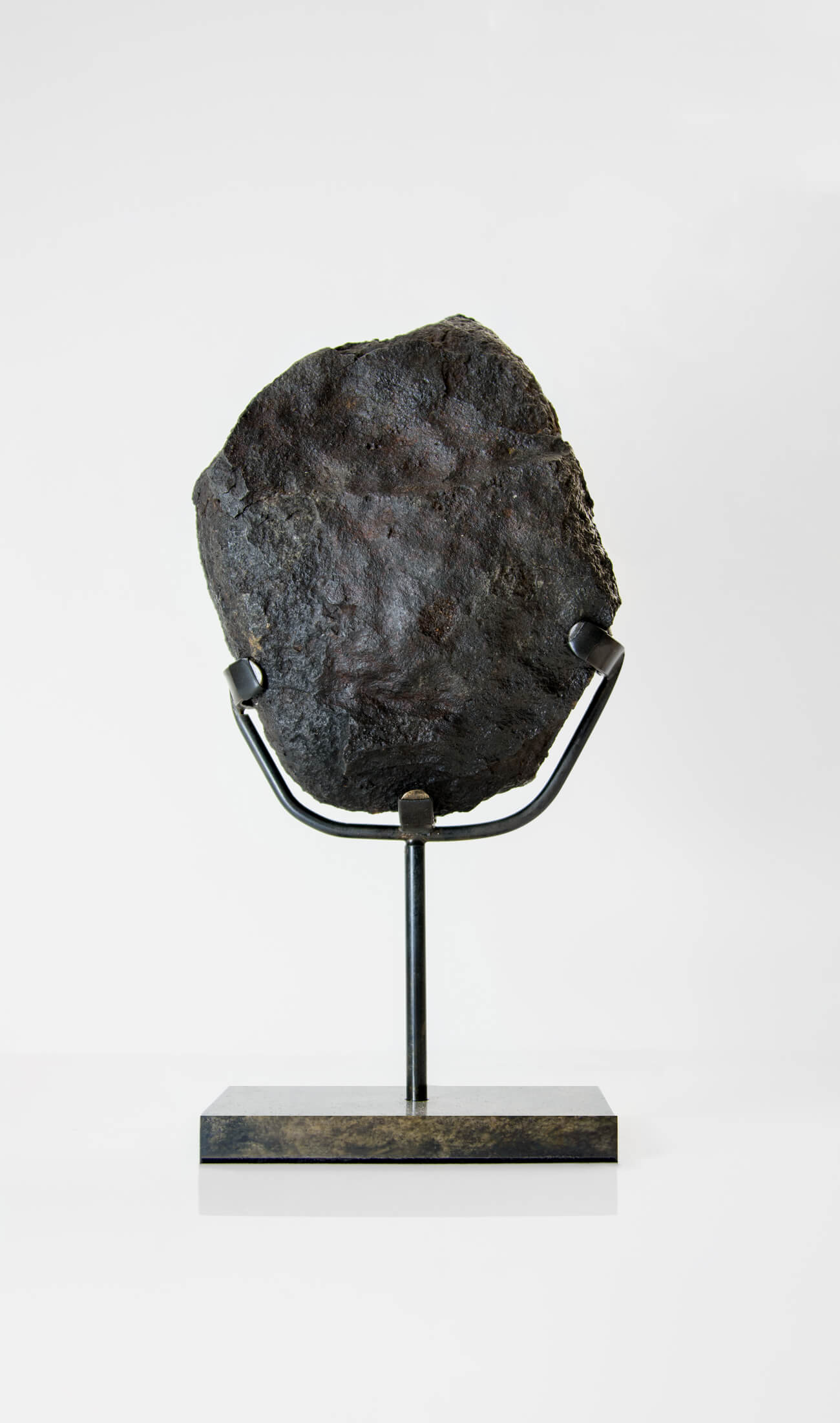 Our fallen star series NWA H5 Iron Meteorite presented on a luxury custom-designed bronze stand weighing 2247 grams