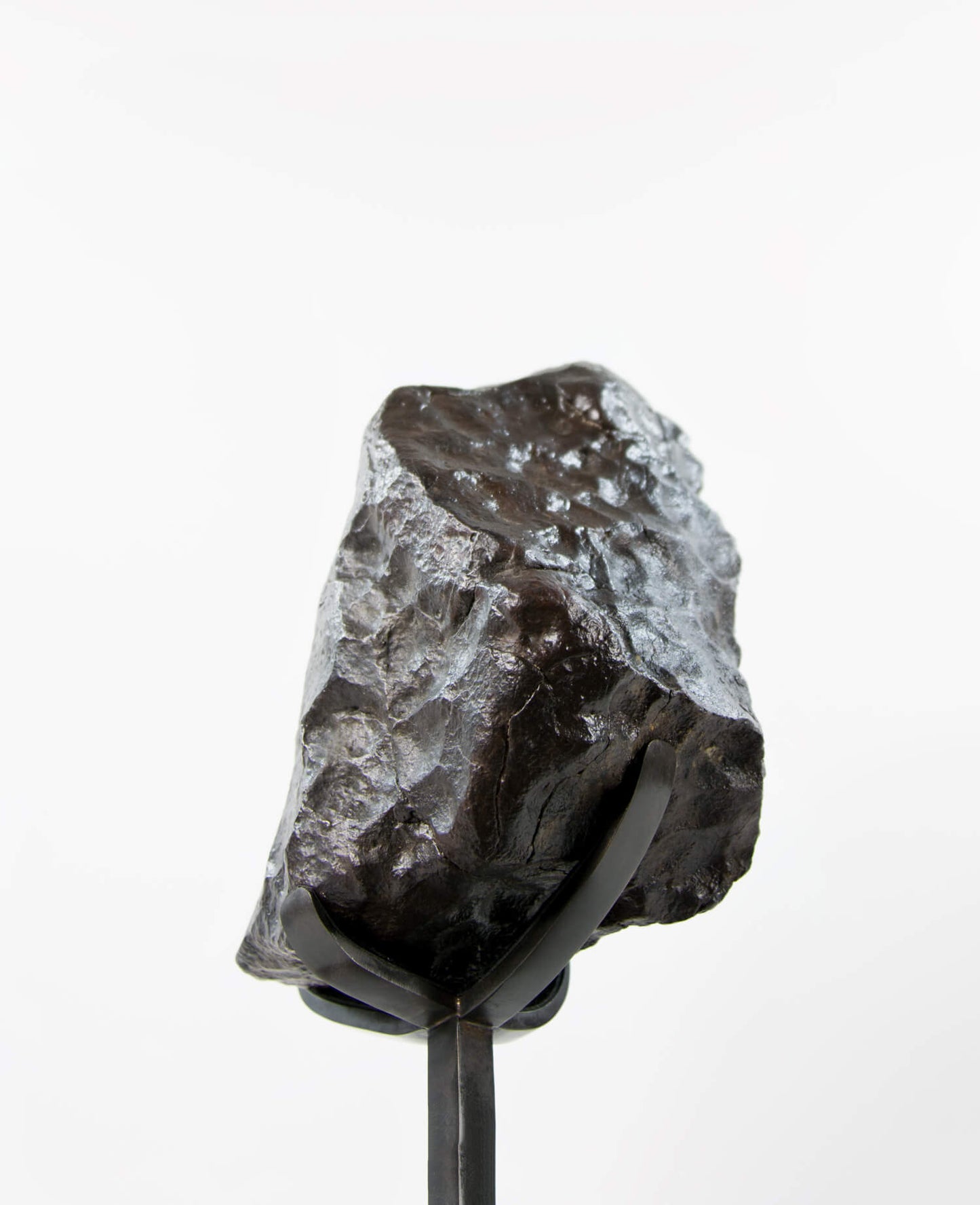 Our fallen star series brings you a NWA H5 Iron Meteorite presented on a luxury custom-designed bronze stand weighing 6.5 kg