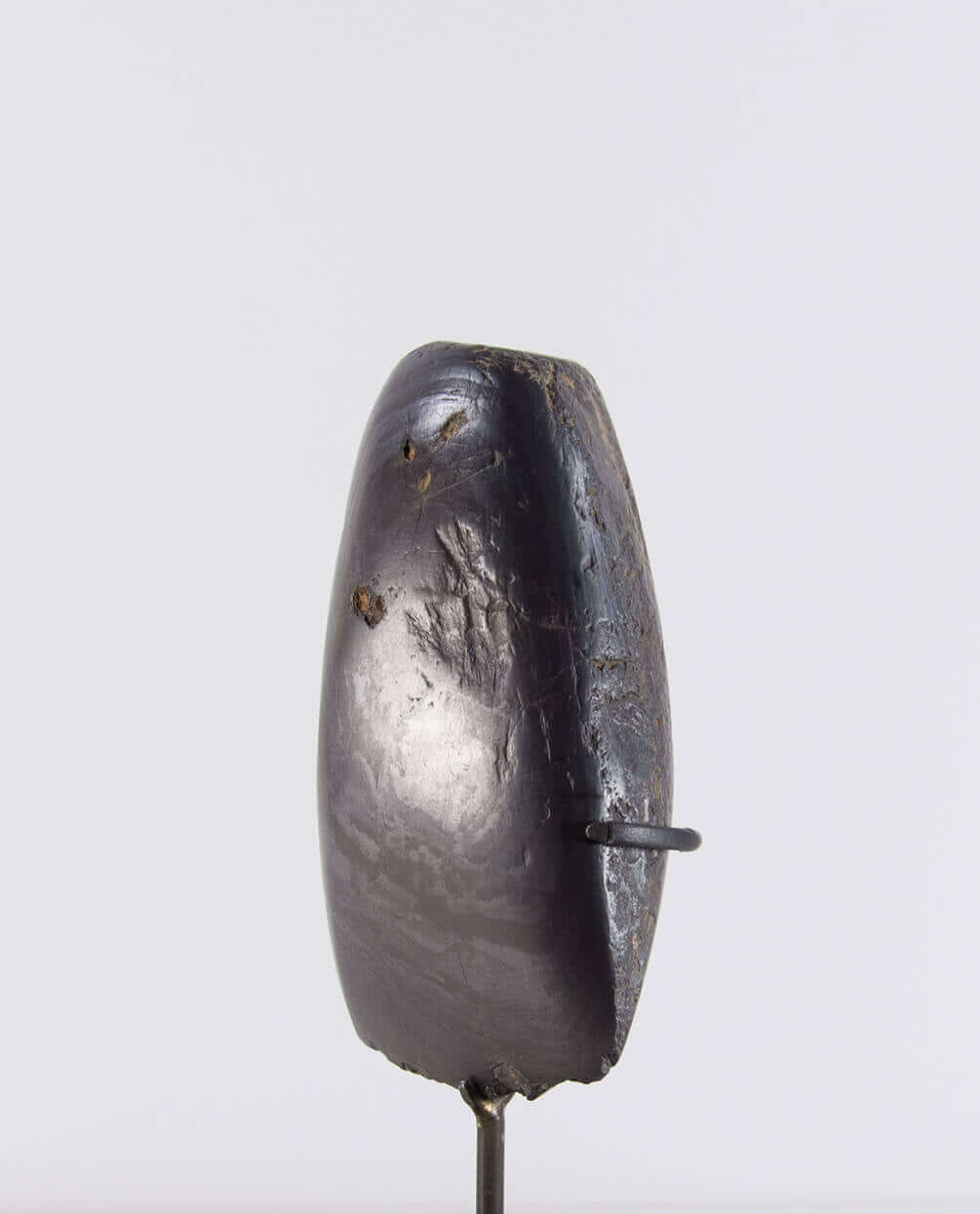 A stunning museum-standard rare authentic heavy hematite Neolithic hand axe measuring 125mm created by an ancient hand