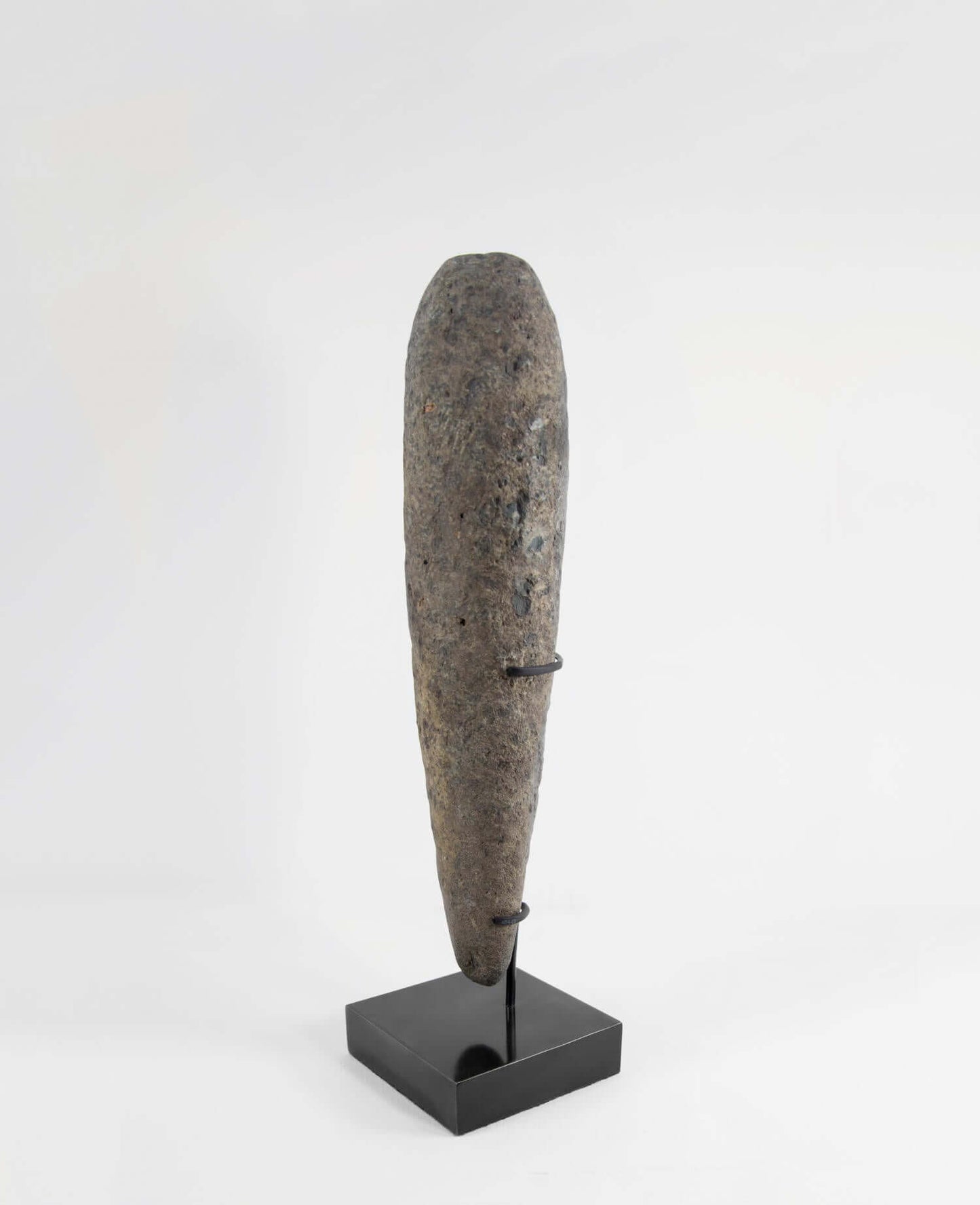 A stunning museum-standard rare authentic Neolithic pestle measuring 350mm created by an ancient hand