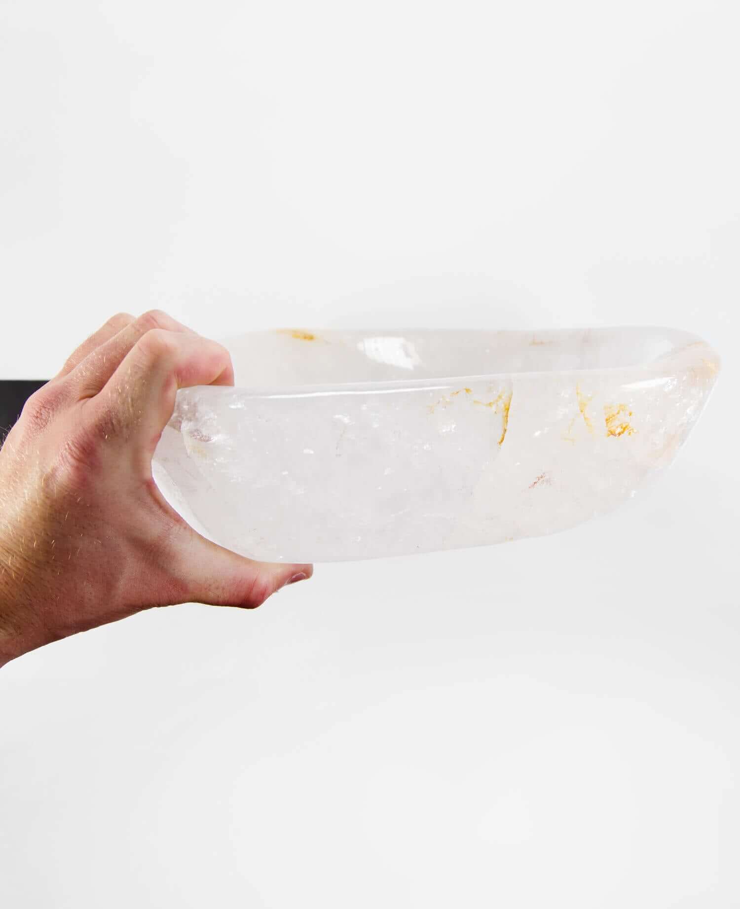 A stunning hand-crafted white crystal quartz mineral bowl for sale designed for luxury interior spaces measuring 260mm