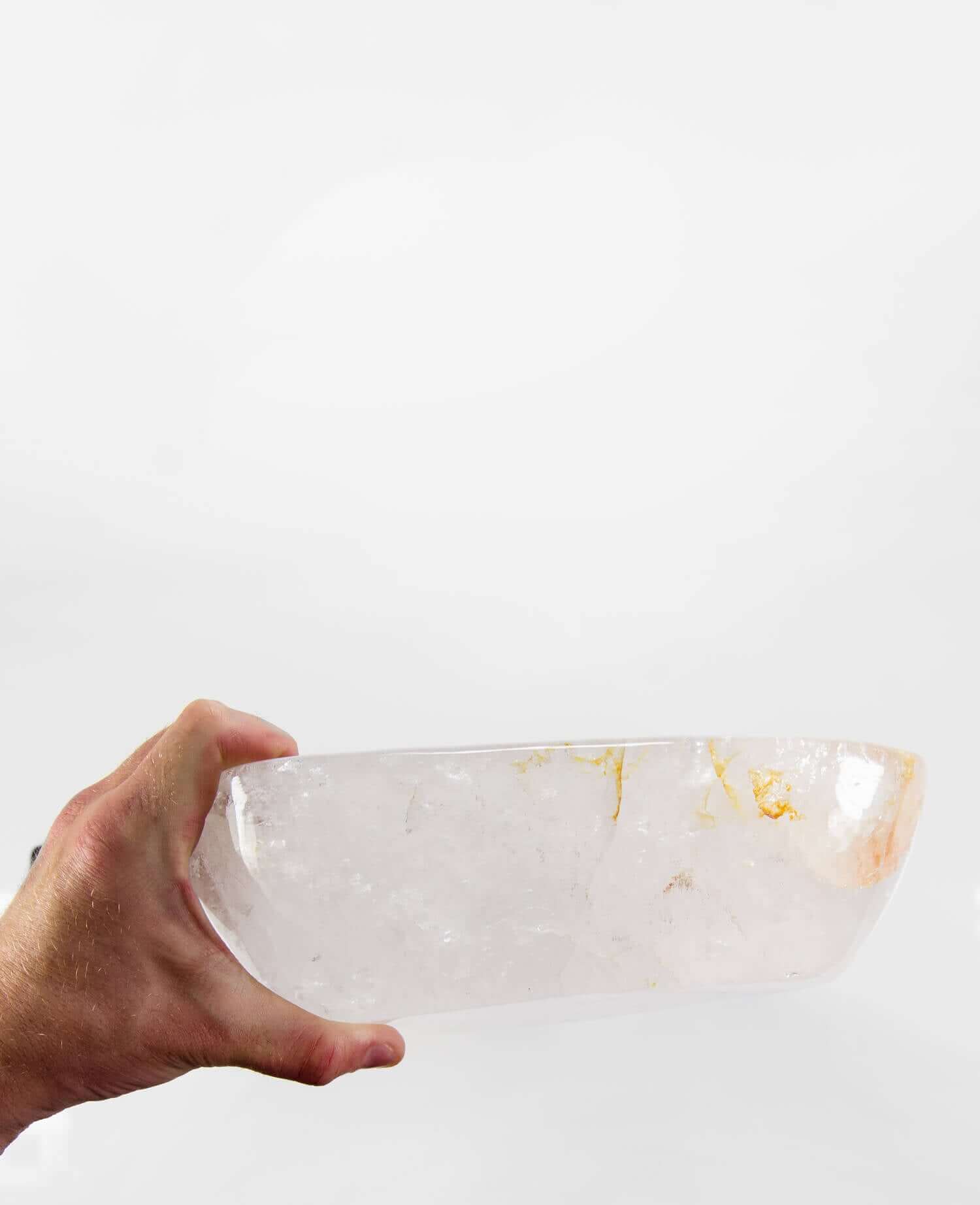 A stunning hand-crafted white crystal quartz mineral bowl for sale designed for luxury interior spaces measuring 260mm