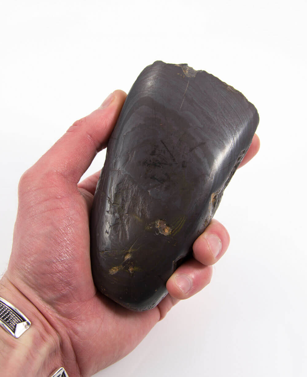 A stunning museum-standard rare authentic heavy hematite Neolithic hand axe measuring 125mm created by an ancient hand