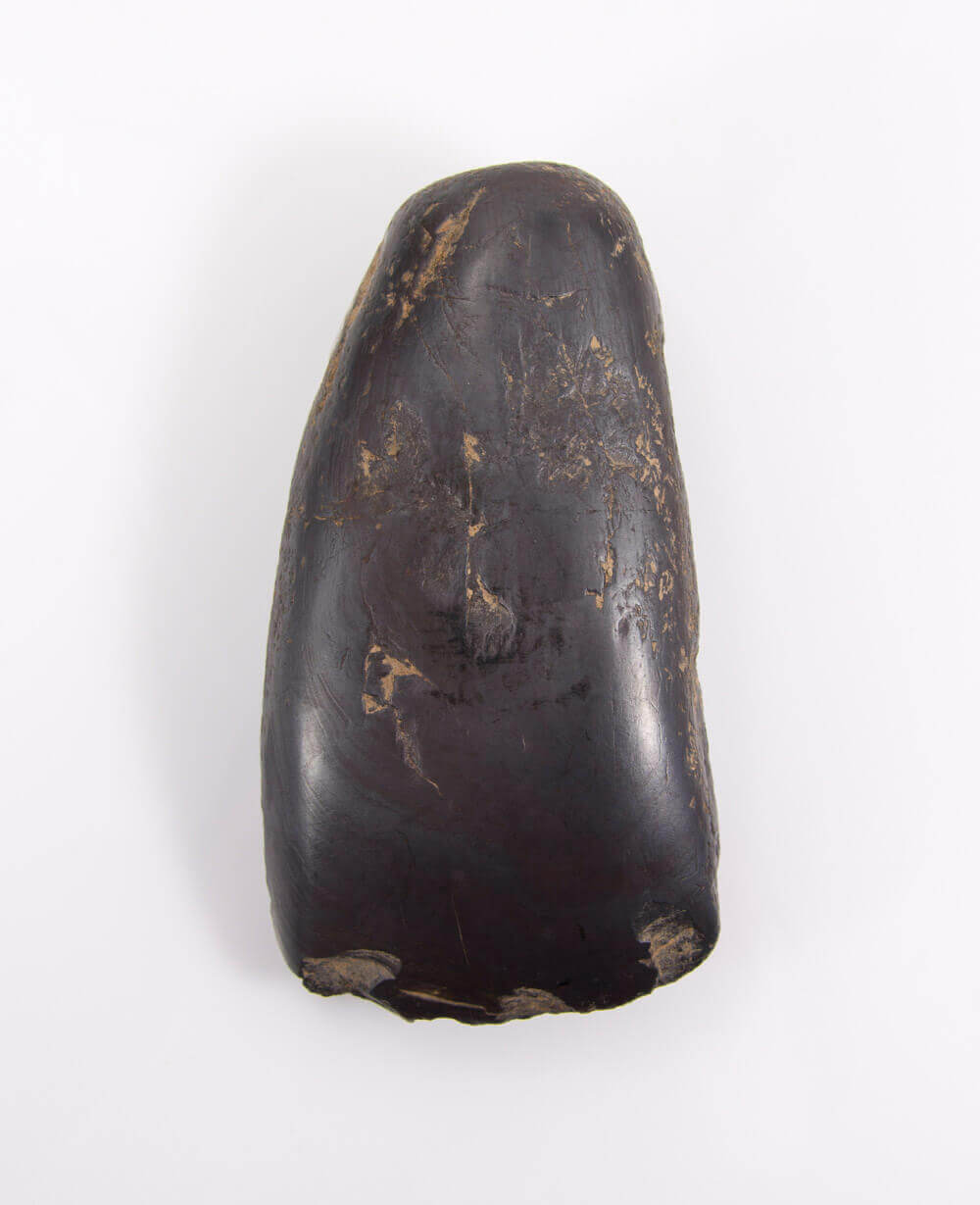 A stunning museum-standard rare authentic heavy hematite Neolithic hand axe measuring 125mm created by an ancient hand