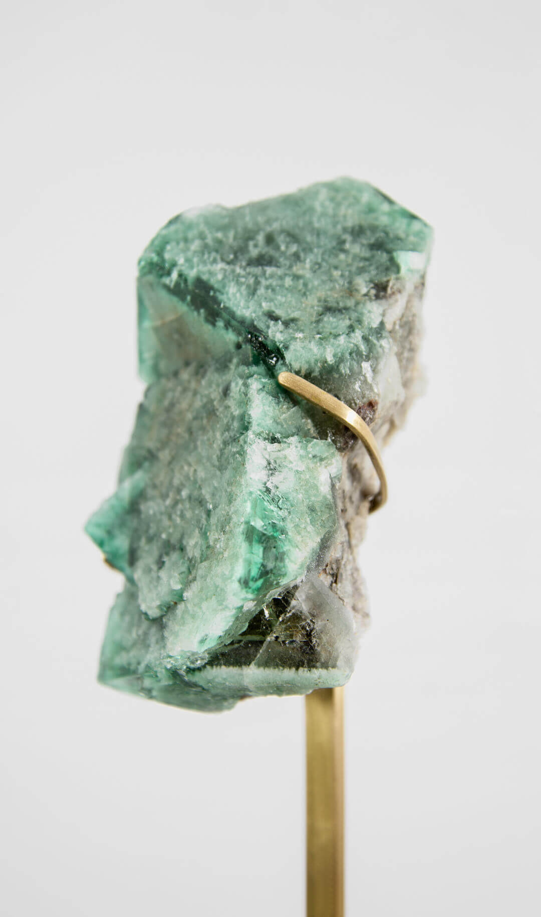 stunning green British fluorite for sale on the fossil store custom brass stand 006