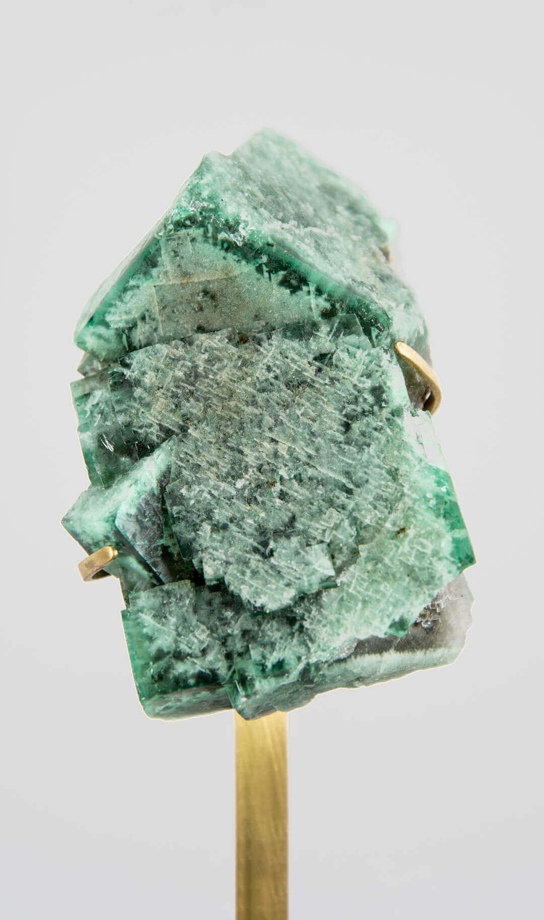 stunning green British fluorite for sale on the fossil store custom brass stand 008