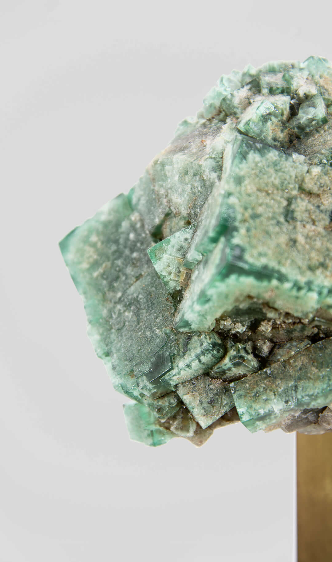 stunning green British fluorite for sale on the fossil store custom brass stand 15