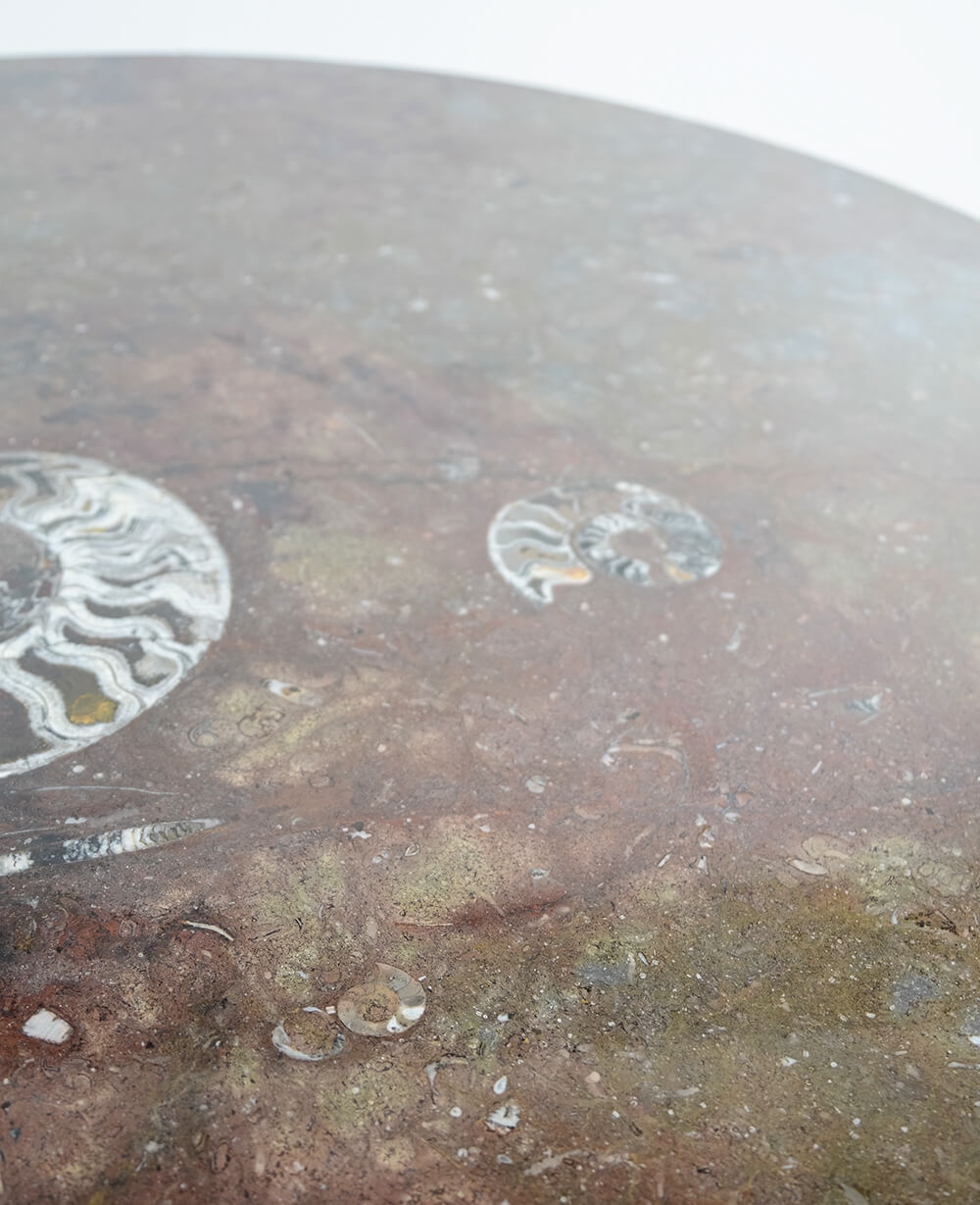 A stunning hand-crafted fossil marble and quartz round tabletop for sale for luxury dining measuring 1.3 meters