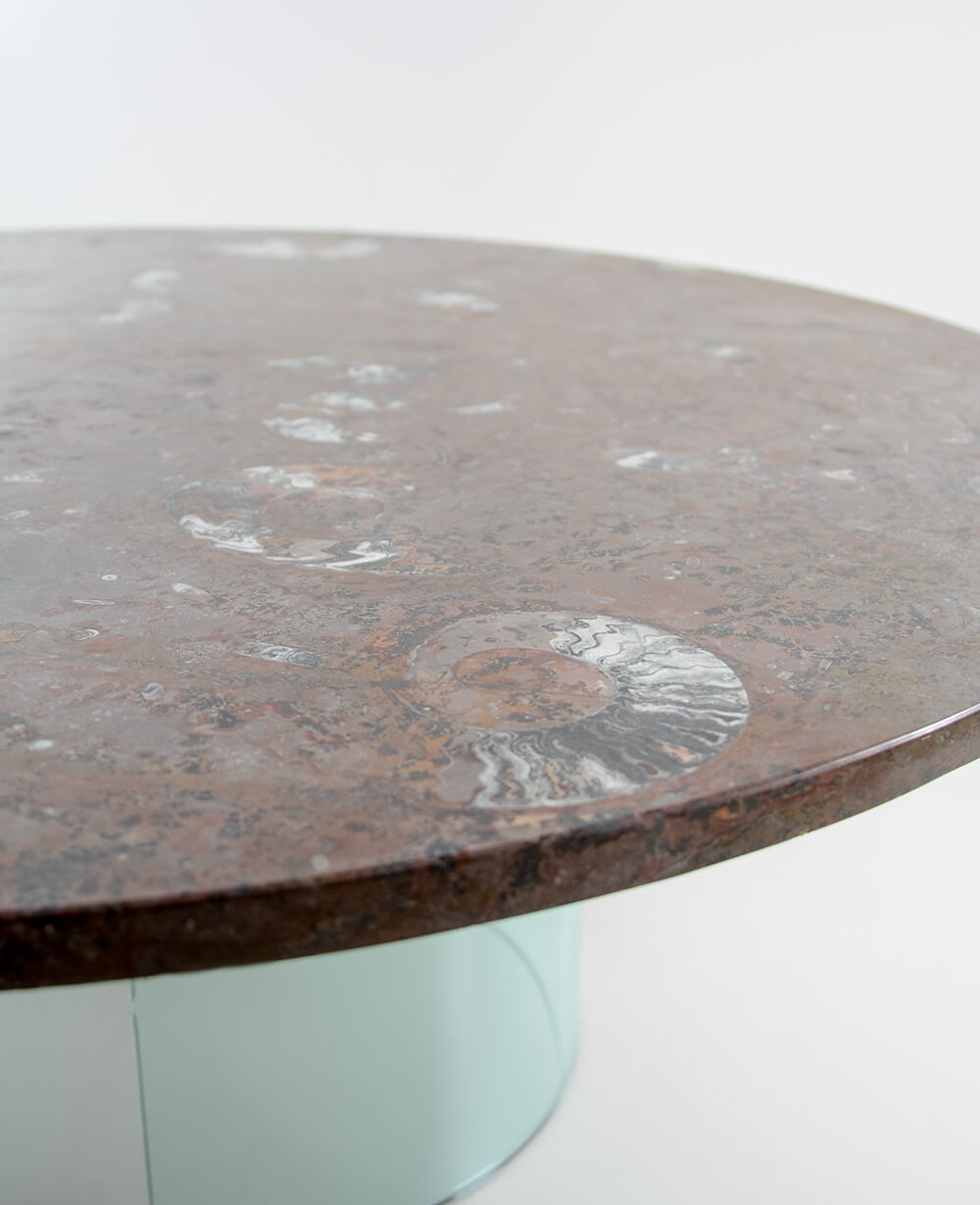 A stunning hand-crafted fossil marble and quartz round tabletop for sale for luxury dining measuring 1.2 meters