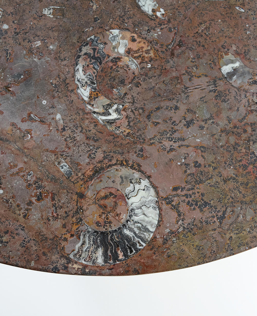 A stunning hand-crafted fossil marble and quartz round tabletop for sale for luxury dining measuring 1.2 meters