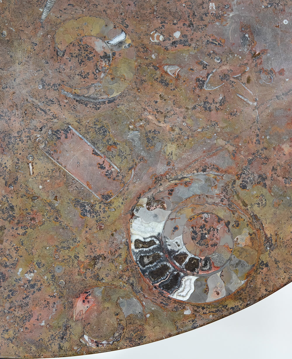 A stunning hand-crafted fossil marble and quartz round tabletop for sale for luxury dining measuring 1.2 meters